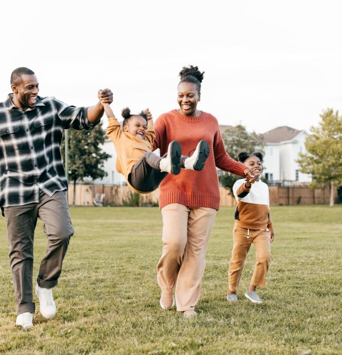 Family enjoying springtime outdoors with kids